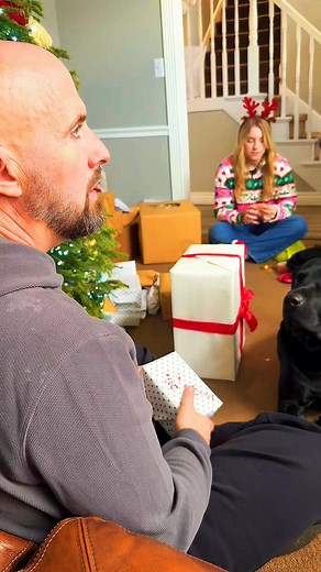 Lab pups on Instagram: "It's the most wonderful time of the year! This `funny animal videos` clip features a `labrador` interacting with wrapped presents, bringing all the festive cheer. It's a heartwarming `funny dog` moment, perfect for anyone who enjoys `funny dogs` and `dog videos`. 🐾💖 #Christmas #blacklabrador"