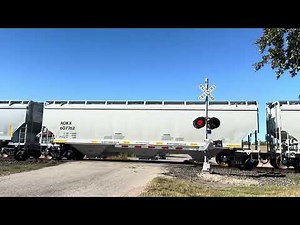 BNSF SD60M Triclops & Dash 9 With New Grain & Rock Hoppers (San Antonio St Crossing Sabinal TX)