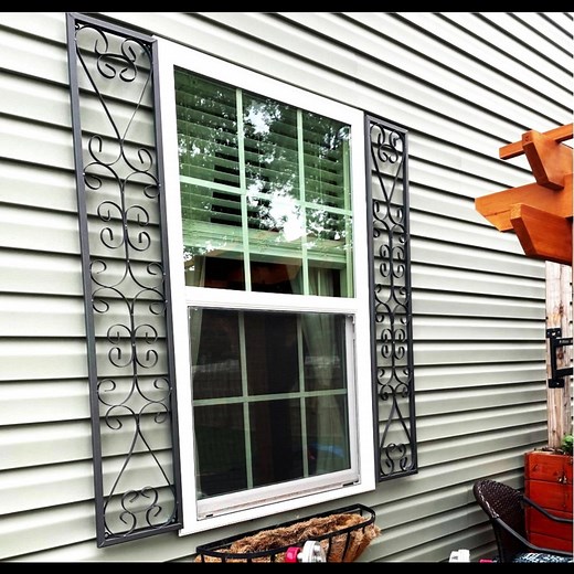 Elevate your home's curb appeal in no time with our stunning metal decorative shutters! These stylish additions not only enhance your exterior but also provide a touch of sophistication and charm. They withstand the elements while adding a unique flair to your windows. Plus, with various designs you can find the perfect match for your home's personality. Transform your home today with our beautiful metal shutters! www.arusticgarden.com #curbappeal #wroughtironwork #metalwork #shutters | A Rustic