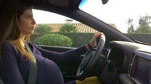 clip-24127441-beautiful-pregnant-woman-driving-car-starting-feel