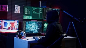 Hacker inserting USB in computer after managing to steal sensitive data, close up. Scammer uploading storage drive into PC after obtaining sensitive information from users using malware, camera B