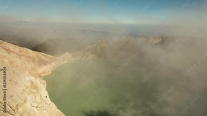 Kawah Ijen, crater with acidic crater lake the famous tourist attraction, where sulfur is mined. Aerial view of Ijen volcano complex is a group of stratovolcanoes in the Banyuwangi Regency of East