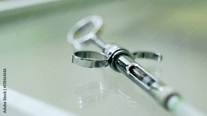 metal syringe for injection. dental equipment. anesthesia in dentistry