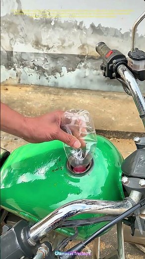 DIY Oil Siphon: Using a Plastic Bottle and Tube to Extract Oil from a Tank