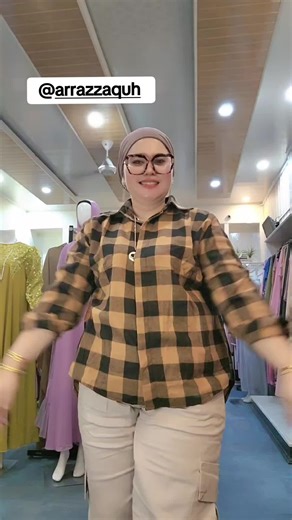 Fashionable Outfit Showcase in Clothing Store