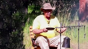 Forging a skillet holder for campfires