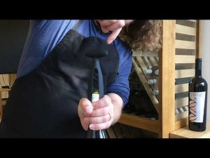 Open a wine with the self pulling corkscrew. How to use a screwpull corkscrew.