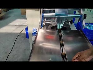 Coconut Laddu Packaging - Flow Wrap Packing Machine