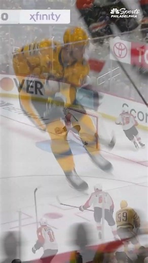 Sean Couturier delivers a heavy hit on Egor Chinakhov in Flyers vs. Penguins Game 1
