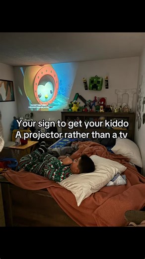 This has been a game changer and I can control what he watches 🤩 #miniprojector #forkids