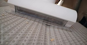 Close-up of cleaning the car seat with a vacuum cleaner. A woman's hand vacuums the car at home. High quality 4k footage