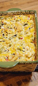 Chicken and Wild Casserole 6-ounce box Uncle Ben's Long Grain and Wild Rice, cooked according to directions 1 cup chopped Onion, sauteed in 1 tablespoon Butter 3 cups cooked, deboned chicken (I leave my pieces big to see them well) (2) 14-ounce cans Green Beans, drained 4-ounce jar diced Pimentos, drained 10.5-ounce can Cream of Celery Soup 1 cup Mayo 1 cup shredded Cheddar Cheese Pinch of Salt and Pepper to taste Mix all ingredients together and pour into a buttered casserole dish. Bake at 35 t