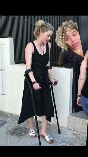 Amber Heard spotted on crutches, says she injured herself training for the NYC marathon