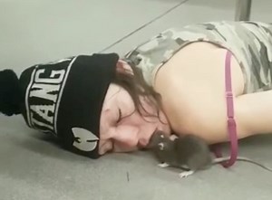 Damn: Man Records Woman Passed Out On The Subway As A Rat Eats Out Of Her Mouth!