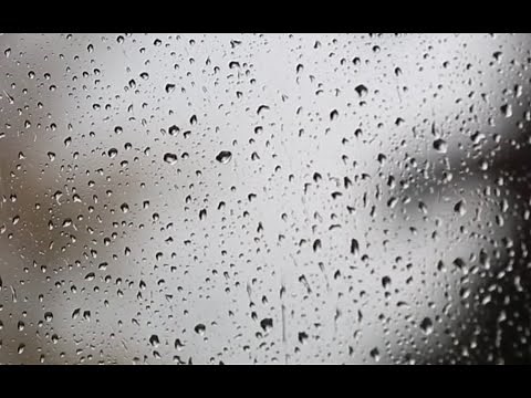 Rain pattering gently against a window, ASMR, no talking