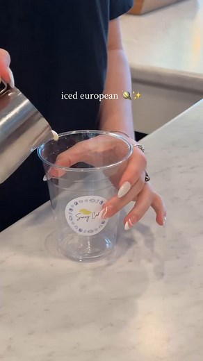 House Coffee Special: Iced European 🪐✨ Made with cold brew, sweetened condensed milk, and evaporated milk. A simple twist for cold brew lovers! Did you know? 🧐✨ Fresh milk was harder to obtain in certain parts of Europe, so often times shelf stable milk was the only option. Sweetened condensed milk is a common addition to many coffee drinks, making it sweet and creamy at the same time. Give it a try the next time you stop in! ☕️✨ #cafe #coffee #european #coldbrew #aesthetic #regional | Sunny C