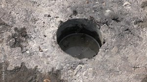 Examination of the quality of the asphalt. Technological cutout in the new asphalt. asphalt road cut round sample of asphalt quality