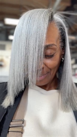 John George III on Instagram: "Silver Fox, Salt n Pepper, The Silver Surfer Are all terms of endearment. I restructured and revamped this beautiful grey mane. Using flat or square Layers, I was able to give this hair shape without compromising a ton of length. I also rounded her perimeter, so that when her is straight and old. She can have a soft and pleasant shape. As opposed to the sometimes ridged shape of a straight perimeter. With a long side swooped bang to compliment the shape and face. #