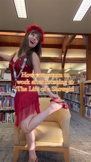 Shannon Hargreaves on Instagram: "Back to the 9–5, but make it ✨showgirl era✨ Another reason why I love working at the library, I can give the books their very own concert. I don’t know if it gets better than that! What’s your favorite song on The Life of a Showgirl? #thelifeofashowgirl #swiftie #bookstagram #librarylife #librariesofinstagram #opalite #taylorswiftfan"