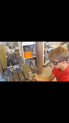 Krystiano Maldonado operating the Van Norman No6 Knee Mill while building Rat Tryke. | Griz Drylie