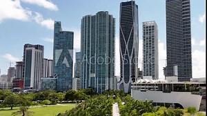 rising capture of downtown miami buildings showing skyscrapers during a bright sunny day in south florida metropolis