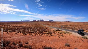 Timelapse in Monument Valley with panoramic viewpoint at Forrest Gump point - Native american - Archaeology history and discovering Navajo culture