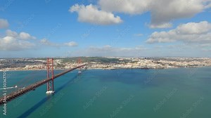 Aerial view over 25th of April Bridge in Lisbon also called Salazar Bridge - travel photography Stock Video