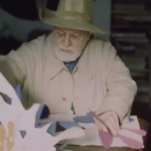 Rare silent film captures Henri Matisse at work in 1951, cutting into sheets of painted paper. 1946