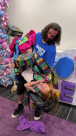 Adley's Neon Rainbow Merch Drop: Backpacks, Keychains, and More!