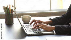 woman using laptop computer,typing laptop keyboard,business and technology working on desk,