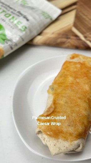 #ad Say “YUM” if you would eat this Parmesan Crusted Caesar Chicken Wrap 🤤🌯 I love these @Southern Recipe Small Batch Zero-Carb Krutones because they have the crunch of a crouton with tons of flavor and they’re loaded with collagen 👏 Check out the link in my bio to see if a store near you has them 🙌 To make the wrap: Add Parmesan, grilled chicken, romaine lettuce, Caesar dressing and Southern Recipe Small Batch Zero-Carb Italian Style Krutones to a low carb tortilla. Roll it up like a burrit