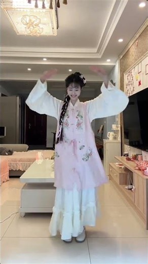 Embrace the Spring: Dance Among Peach Blossoms