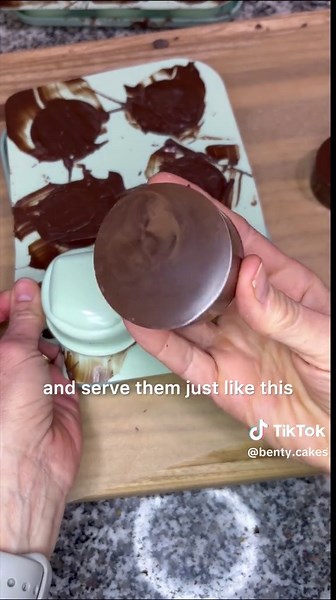 This recipe is SO easy it’s dangerous! One of my most popular Pucks! If you love Reeces peanut butter cups this homemade version will make you so happy. It’s one of my most popular pucks and not only is it the best dupe I’ve ever tried, it sets up so fast and it’s always a crowd favorite! If you haven’t gotten your own mold set now is the time to grab one and get Pucking!! #peanutbuttercups #cakepucks #bentycakes #copycat