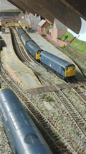 Lima class 47 racing through the station.