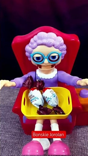 GRANDMA WITH MORE CHOCOLATE CANDY ON HER TABLE #ASMR#shortvideo #asmrvideo