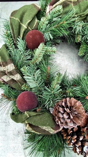 1.3K views · 13 reactions | Turning a simple wreath into Christmas chic! ✨ All you have to do is weave in a scarf and add a few holiday decorations. That’s it... the easiest festive glow-up. 泥 This gorgeous green plaid scarf is from our Lilie's Boutique, on sale now at just $9.99! Available at both our Barrie and Bradford locations. #HolidayDIY #BradfordGreenhouses #DIYWreath #diy #wreath #wreathdiy | Bradford Greenhouses Garden Gallery | Facebook