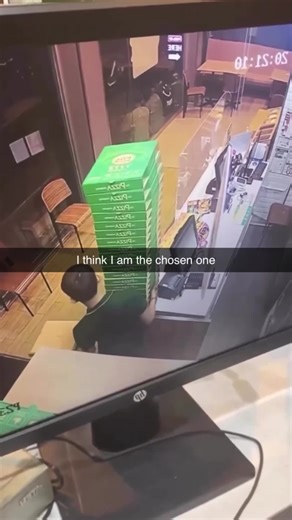 Funny Store Employee Interacting with Pizza Boxes