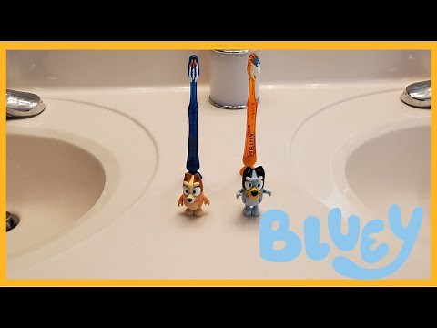 Bluey and Bingo learn to brush teeth with light up toothbrushes