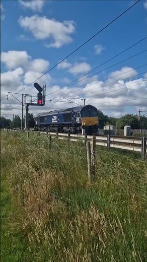 Class 66 429 pulls tesco containers through Winwick jn with tones. #train #trainspotting #class66