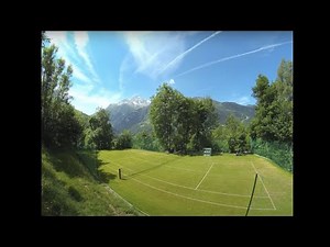 I built a grass tennis court in the Alps. Intensive DIY project that WAS worth it in the end !
