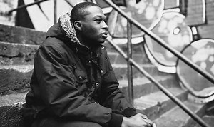 Emay Dances With A Riot Gear Devil In The Video For “Bakkah: The History of Humankind”