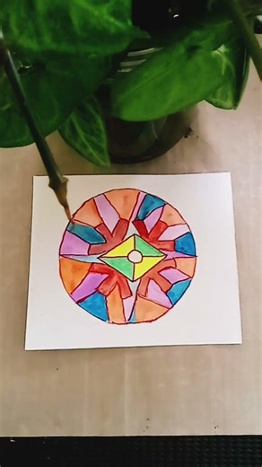 Capture the abstract rangoli pattern design