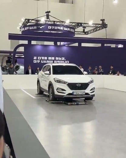 Autonomous Robots Lift and Move a Car