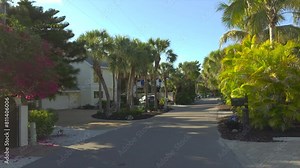 Driving on Casey Key scenic road in Florida.