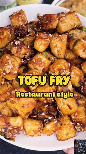Vidya Srinivasan on Instagram: "Crispy Sesame Garlic Tofu | Sesame Tofu Fry | Restaurant-Style Pan-Fried Tofu No matter how hard you press tofu, does it still turn bland? 👉 Try this boiling method — it helps tofu absorb flavours perfectly every single time ✨ Crispy on the outside, soft inside 😋 This restaurant-style sesame garlic tofu fry is ready in under 15 minutes and makes a perfect starter, side, or bowl topping 💛 📌 Recipe pinned in comments #CrispyTofu #sesa
