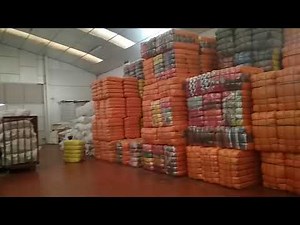 Wholesale containers of used clothing in bales