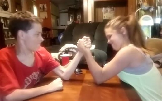 Arm Wrestling 12 yr old girl beats 2 boys