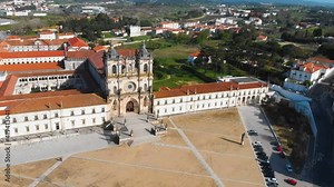 4k aerial drone footage of Mosteiro de Santa Maria de Alcobaca or Roman Gothic Monastery of Alcobaca, Unesco Heritage in Portugal. The church and monastery were the first Gothic building in Portugal.