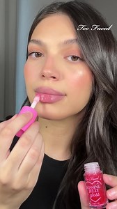Gift instantly hydrated lips this holiday season with the viral Too Faced Kissing Jelly Lip Oil Gloss, available in six juicy scents! | Ulta Beauty