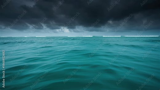 Ominous Ocean: The boundless ocean under a sky heavy with foreboding clouds, with waves rolling in the distance, evokes a sense of vastness and the raw power of nature.